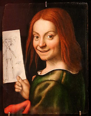 Portrait denfant montrant un dessin